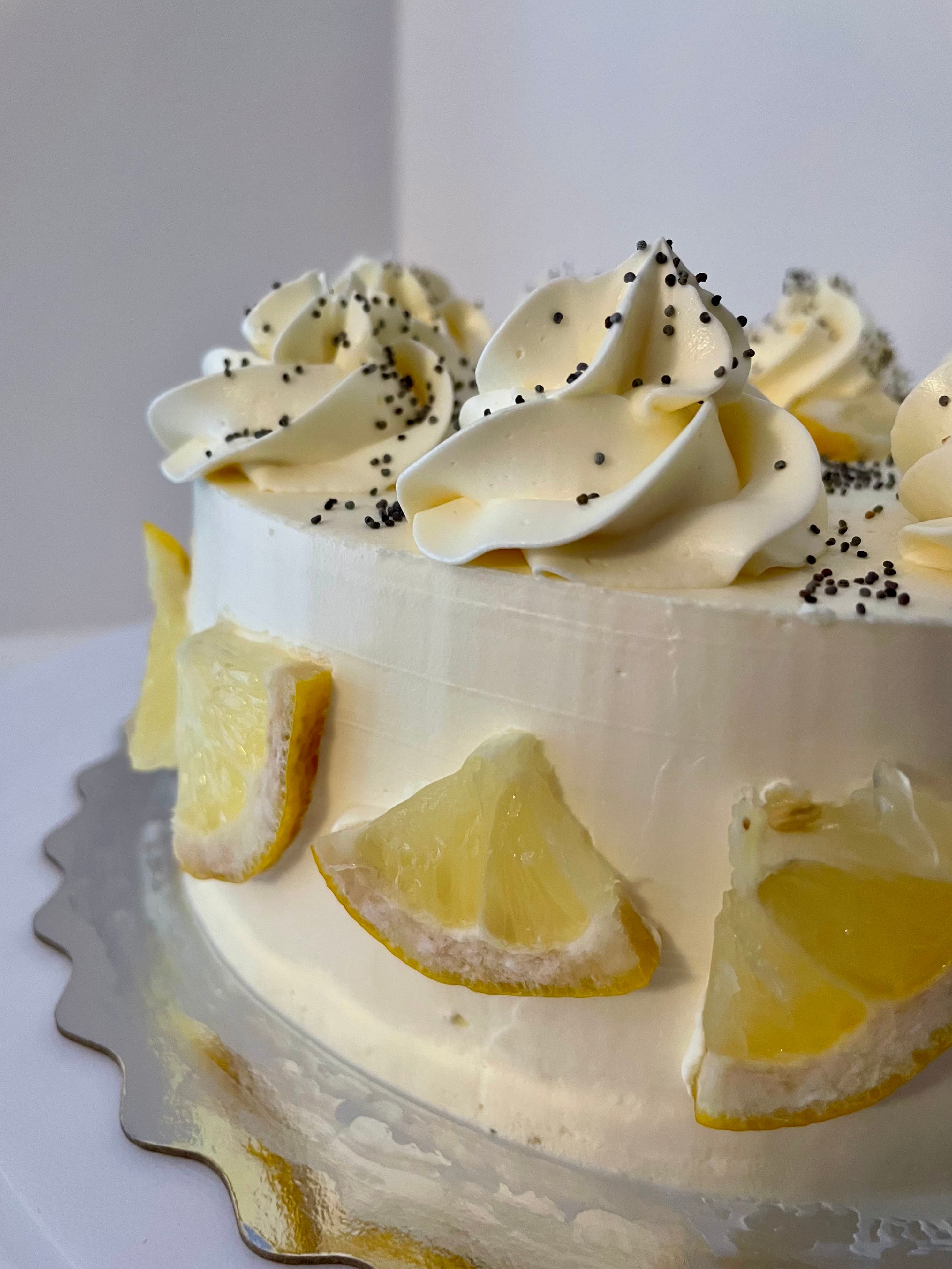 Close-up of a lemon poppyseed cake with lemon decorations